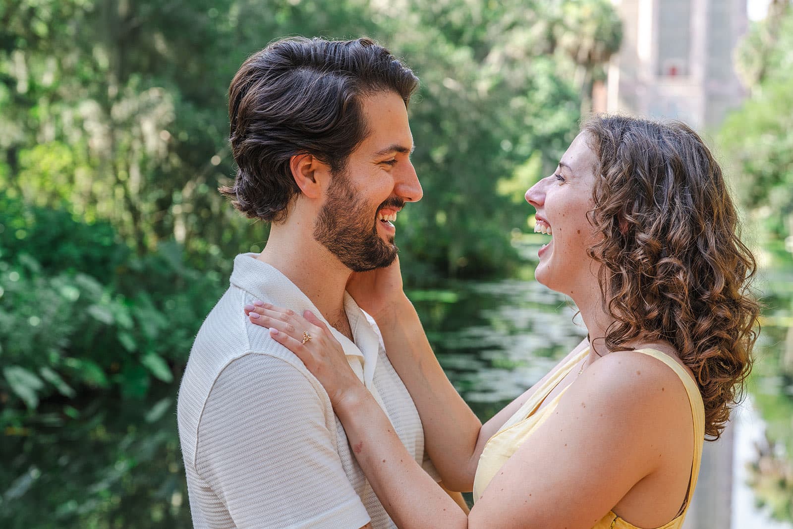 Couple laughing together, candid close-up