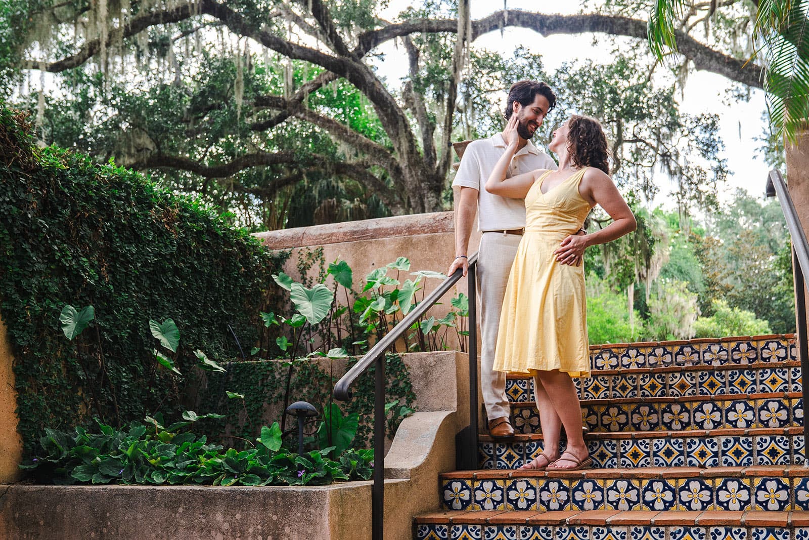 Couple on Spanish tile staircase