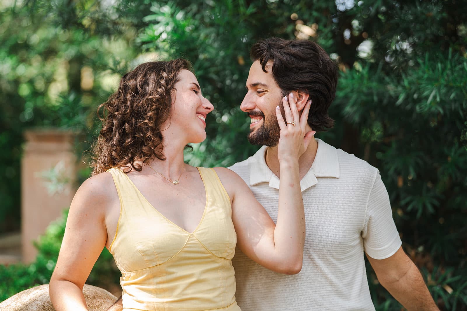 Tender close-up, hand on cheek