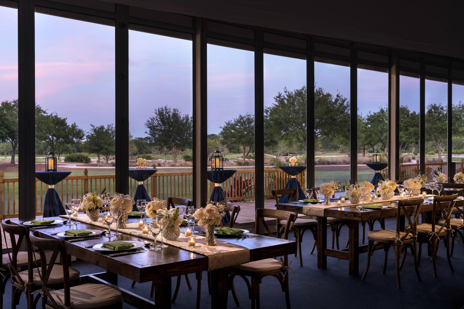 A wedding reception set up at golden hour at The Ritz-Carlton Naples, Tiburón